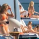 Put clothes on, you are mom of 2 ‘ Patrick Mahomes wife face criticism after Matches Her Barely-There Orange Bikini to Her Sunglasses for Boat Day